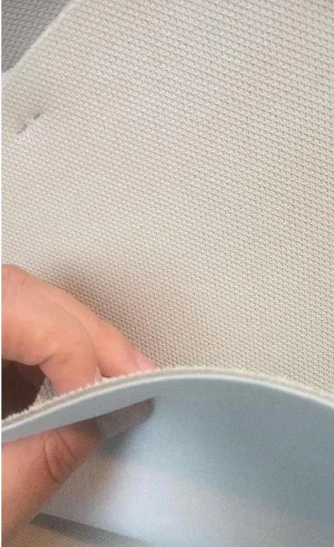 Foam-backed automotive headliner fabric in warehouse inventory